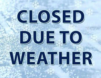 Closed due to weather sign